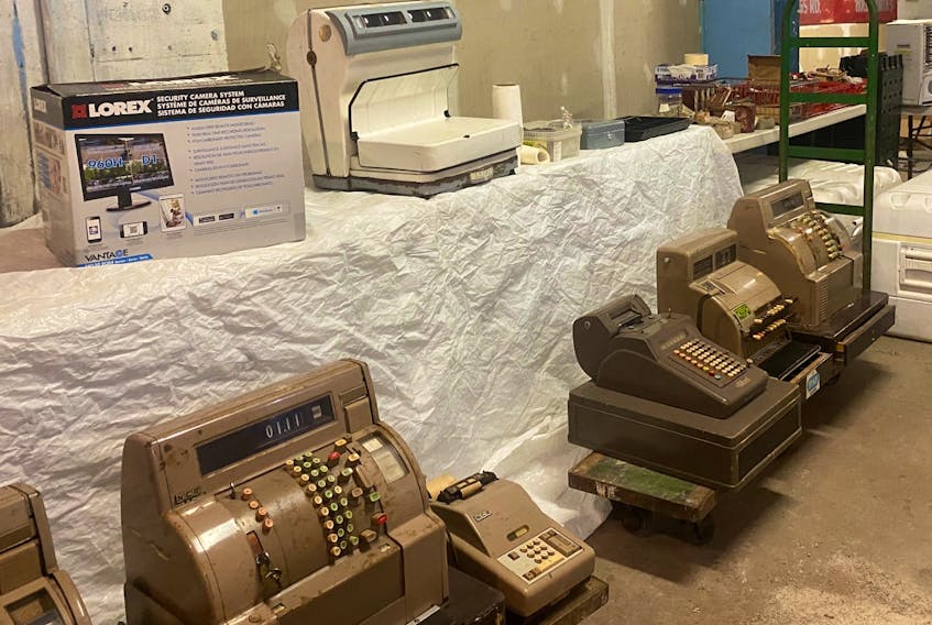 Antique cash registers and a century old calculator are only some of the items that will be for sale in the coming weeks as Moo Moo's holds an online garage sale. Evan Careen/The Telegram
