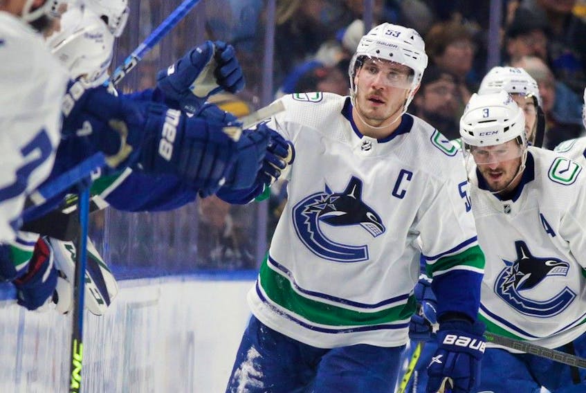 Bo Horvat of the Vancouver Canucks celebrates his goal during the second period of an NHL hockey game against the Buffalo Sabres at KeyBank Center on November 15, 2022 in Buffalo, New York.