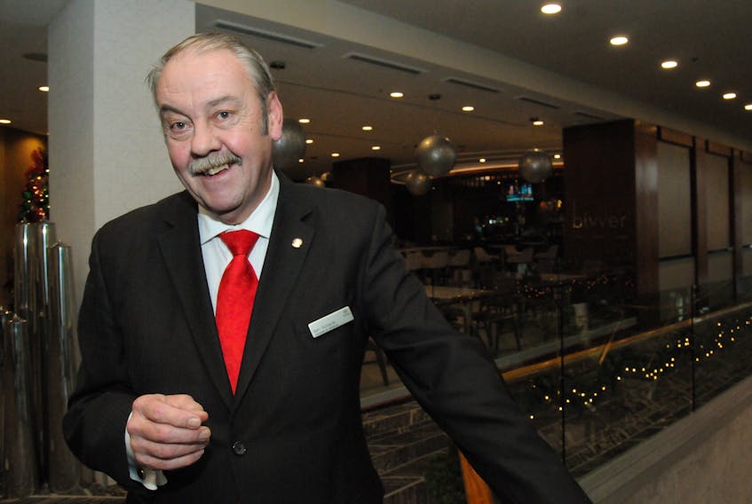 Sheraton Hotel Newfoundland’s food and beverage outlets manager Ken Richards, who recently celebrated his 50-year mark as an employee of the old and new hotel, is shown at the hotel courtyard area.  Joe Gibbons/The Telegram