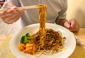 All of the noodles at Noodles Express are freshly made to order, like these, served with Minced Pork Saozi. Gabby Peyton photo