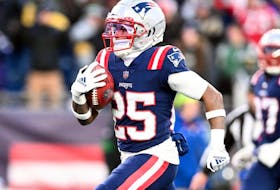 Marcus Jones of the New England Patriots  returns the ball for a touchdown against the New York Jets during the second half at Gillette Stadium on Nov. 20, 2022.


