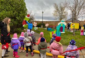 Children from a local daycare out for a walk stop and watch as the Town of Shelburne’s Community Participation and Volunteerism Committee set up Whoville in Atlantic House Park on Water Street for the season. CONTRIBUTED