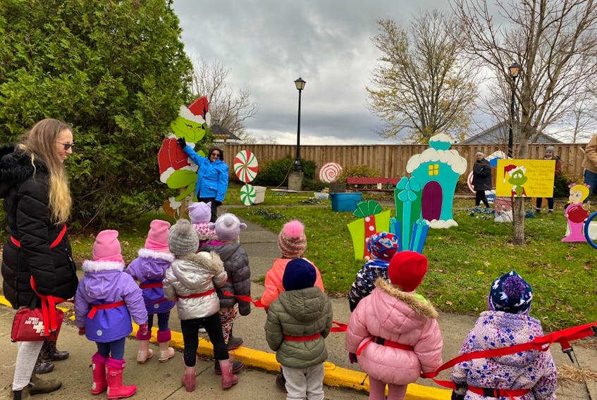 Children from a local daycare out for a walk stop and watch as the Town of Shelburne’s Community Participation and Volunteerism Committee set up Whoville in Atlantic House Park on Water Street for the season. CONTRIBUTED