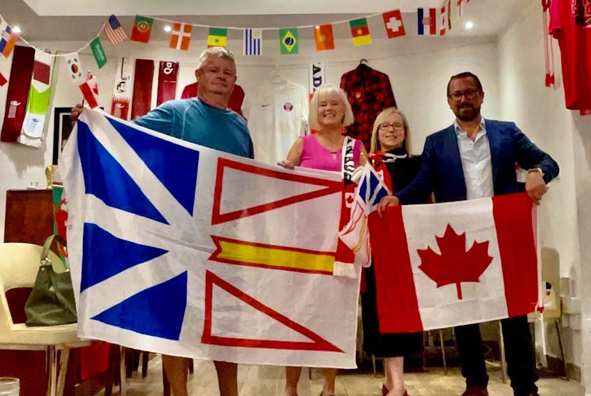Corner Brook native Linda Goodyear (second from left) is in Qatar for her fourth FIFA World Cup soccer tournament. This time, however, she gets to watch Canada at the event. Goodyear is joined here by Linda Budgell (second from right), Aaron Jones (far right) and Shane Dunphy . Contributed photo