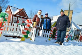 The Mombourqette Christmas Display is just about ready to return to Sydney’s Churchill Drive, featuring thousands of lights and hundreds of displays. Peter Mombourquette, right, started building the display on Nov. 7 and expects it to be ready to light up by Dec. 1. It’ll remain displayed until Ukrainian Christmas on Jan. 7, 2023. He’s shown in front of Santa’s house with longtime helper Ray Oake, left, who has been assisting for more than 10 years. GREG MCNEIL/CAPE BRETON POST