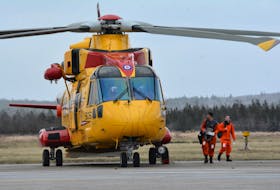 The Canadian Coast Guard and its search and rescue partners, the Royal Canadian Air Force, Department of National Defence, DFO's Conservation and Protection and the Coast Guard Auxiliary, all coordinate to have assets in place on the opening of the LFA 33 and 34 seasons. A Cormorant helicopter, pictured here at the Yarmouth airport, is one of the many assets that will be in the air and on the sea. TINA COMEAU PHOTO