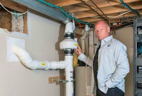 The radon mitigation fan is an essential element of the mitigation system and should be installed by a C-NRPP professional. Mike Holmes in the basement of an installed radon mitigation system. 