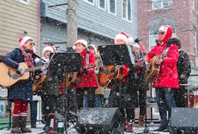 With light snow falling, members of the the Guitar Gals performed holiday songs during the Sydney Downtown Development Association's 2019 Nutcracker Festival in downtown Sydney. The festival returns this year Dec. 2-3. CAPE BRETON POST FILE