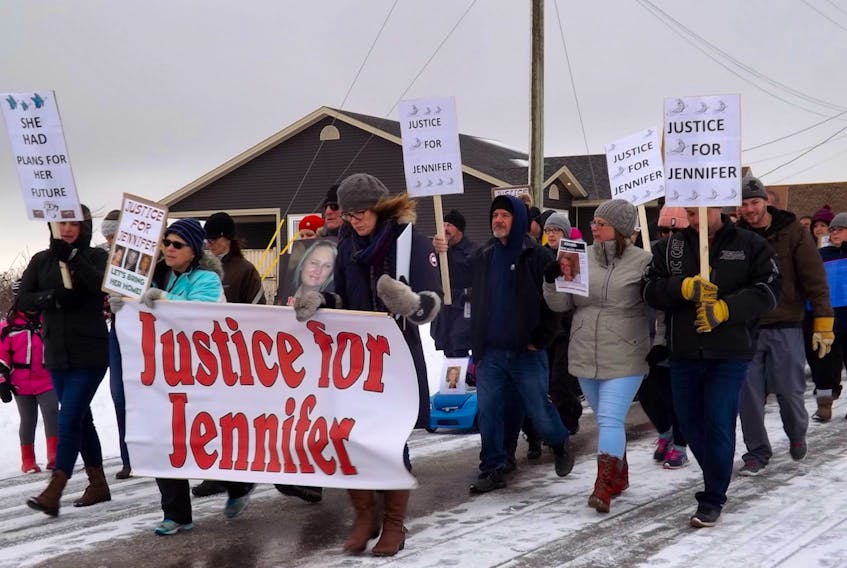 In this file photo, people march through Husky Drive where Jennifer Hillier Penney went missing on Nov. 30, 2016, to demand justice for the missing woman. - Contributed