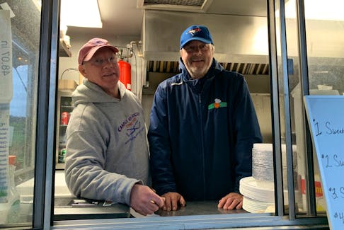 Andrew Dill, right, launched Chef Dilly’s in November 2021 and has been doing brisk business ever since. Several family members, including his cousin, John Trinacty, who is often found helping take orders at the trailer window, have assisted during Chef Dilly’s first year in business.