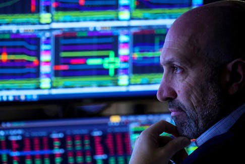 A trader works on the floor of the New York Stock Exchange (NYSE) in New York City.