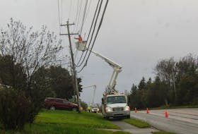 In this file photo, Nova Scotia Power crews work on restoring electricity to customers around the CBRM after hurricane force post-tropical storm Fiona left most of the municipality without power. IAN NATHANSON/CAPE BRETON POST