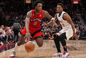Toronto Raptors forward O.G. Anunoby (left) drives to the net past Miami Heat guard Kyle Lowry Scotiabank Arena on Nov. 16.
