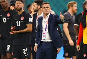 Canada coach John Herdman gives the thumbs up after losing to Croatia at the World Cup yesterday.