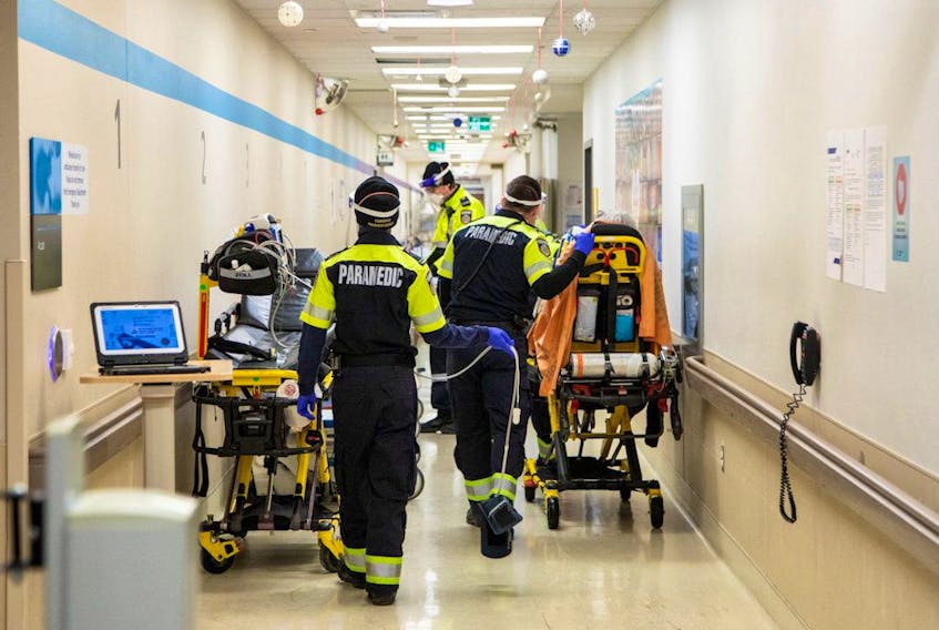 Toronto Paramedics deliver patients to the emergency room at the Humber River Hospital in this Jan. 20 photo. 