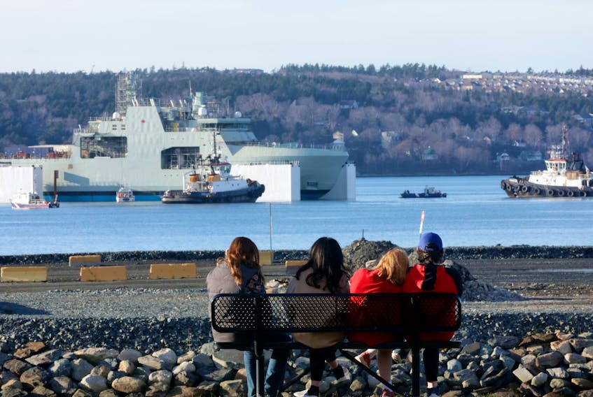 Nov. 27, 2022--Spectators at Seaview Park in Halifax watch the progress of the launch of HMCS William Hall from its floating drydock in the Bedford Basin on Sunday afternoon. The William Hall, the fourth Arctic and Offshore Patrol Ship is named in honour of Petty Officer William Hall, a Canadian naval hero, for his actions at the Relief of Lucknow, India, on Nov. 16, 1857 during the Indian Rebellion.
ERIC WYNNE/Chronicle Herald