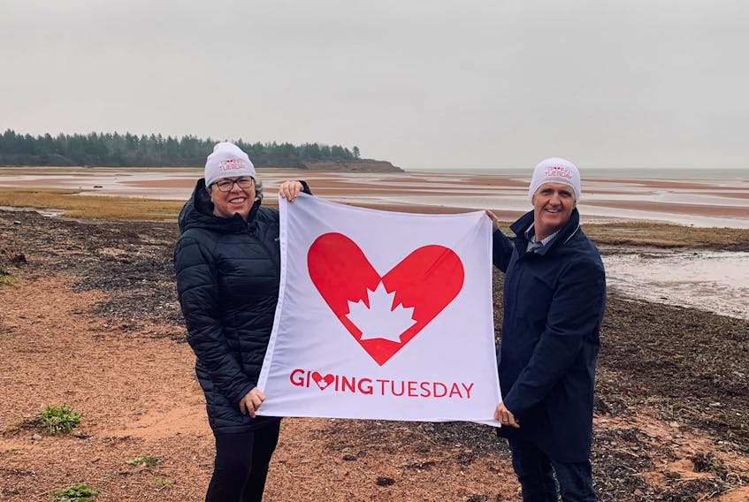 Helen Chapman, left, and Kent Hudson, representing P.E.I.’s Giving Tuesday, invite Islanders to join the movement on Twitter, Instagram and Facebook at P.E.I. Gives. Contributed