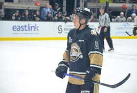Charlottetown Islanders forward Giovanni Morneau awaits a faceoff in a Quebec Major Junior Hockey League (QMJHL) game at Eastlink Centre earlier this season. Morneau scored two goals in regulation time and once in the shootout to help the Islanders to a 4-3 win over the Cape Breton Eagles in a Quebec Major Junior Hockey League (QMJHL) game in Sydney, N.S., on Nov. 27. Jason Simmonds • The Guardian