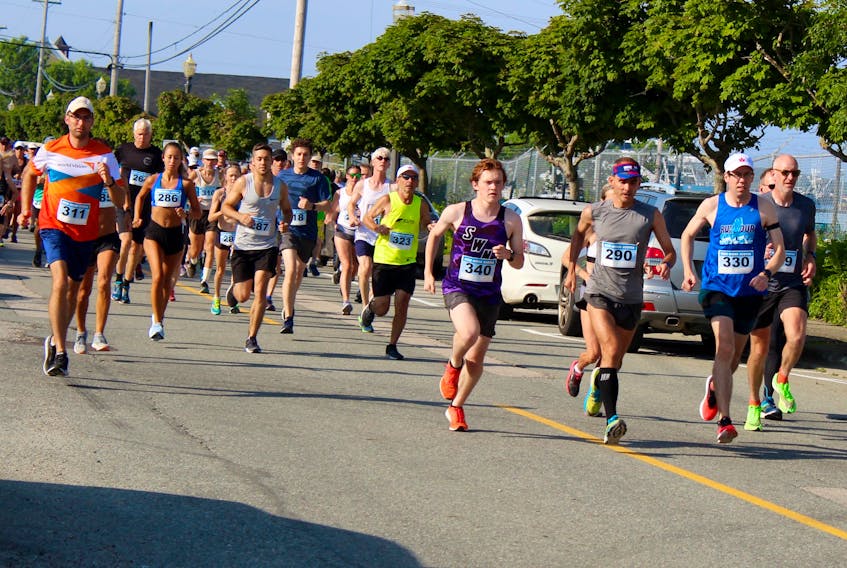 Runners depart from the starting line of the 2019 Sheila Poole 10K in Yarmouth. The race is now being retired. ERIC BOURQUE FILE PHOTO
