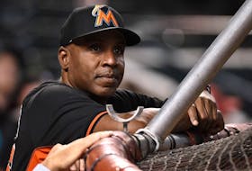 Hitting coach Barry Bonds of the Miami Marlins watches batting practice prior to a game against the Arizona Diamondbacks at Chase Field on June 10, 2016 in Phoenix, Arizona.