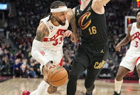 Toronto Raptors guard Gary Trent Jr. (33) drives against Cleveland Cavaliers forward Cedi Osman (16) during the second half at Scotiabank Arena. 