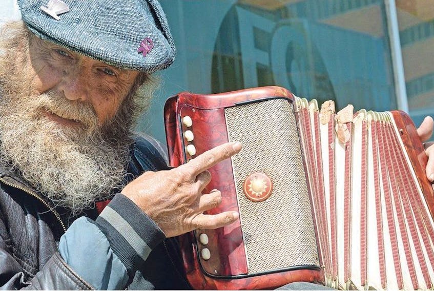 Don Tucker is pictured playing a medley of traditional tunes on his accordion in this April 2016 file photo. -Joe Gibbons/The Telegram file photo