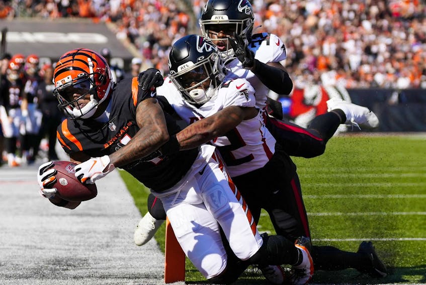Cincinnati Bengals wide receiver Ja'Marr Chase pulls in a catch for a touchdown in the second quarter of the NFL Week 7 game between the Cincinnati Bengals and the Atlanta Falcons at Paycor Stadium in downtown Cincinnati on Sunday, Oct. 23, 2022. The Bengals led 28-17 at halftime.   