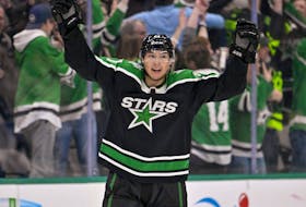 Dallas Stars left wing Jason Robertson celebrates scoring the game tying  goal against the Winnipeg Jets during the third period at the American Airlines Center.  