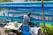  A street artist creates a beautiful image in Barbados. Rita DeMontis/Toronto Sun