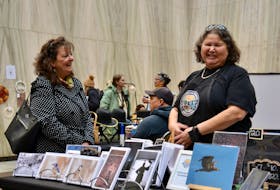 Patricia Bourque, a photographer, had one of dozens of booths set up at the Indigenous Artisans Christmas Market at the Confederation Centre in Charlottetown on Nov. 26. Logan MacLean • The Guardian