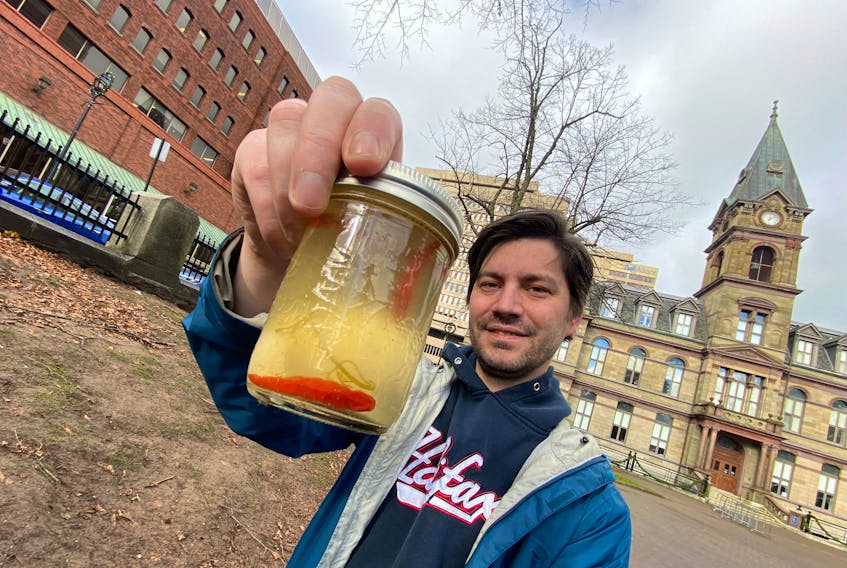 Stephen Mackay is seen with Yolko Ono, a single pickled egg for his Out of the Cold charity fundraiser, in Halifax Monday November 28, 2022. 

Tim KROCHAK PHOTO