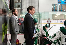 UPEI Panthers head coach Forbie MacPherson, right, and assistant coach Morgan MacDonald follow the action in an Atlantic University Sport (AUS) men’s hockey game against the Acadia Axemen at MacLauchlan Arena in Charlottetown on Oct. 29. The Panthers host the UNB Reds at The Mac on Nov. 4 at 7 p.m. Janessa Hogan Photo • Courtesy of UPEI Athletics