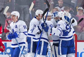 Maple Leafs players, including Mitch Marner (left) celebrate after one of their wins in November, against the New Jersey Devils on Nov. 23, 2022 in Newark, N.J.

