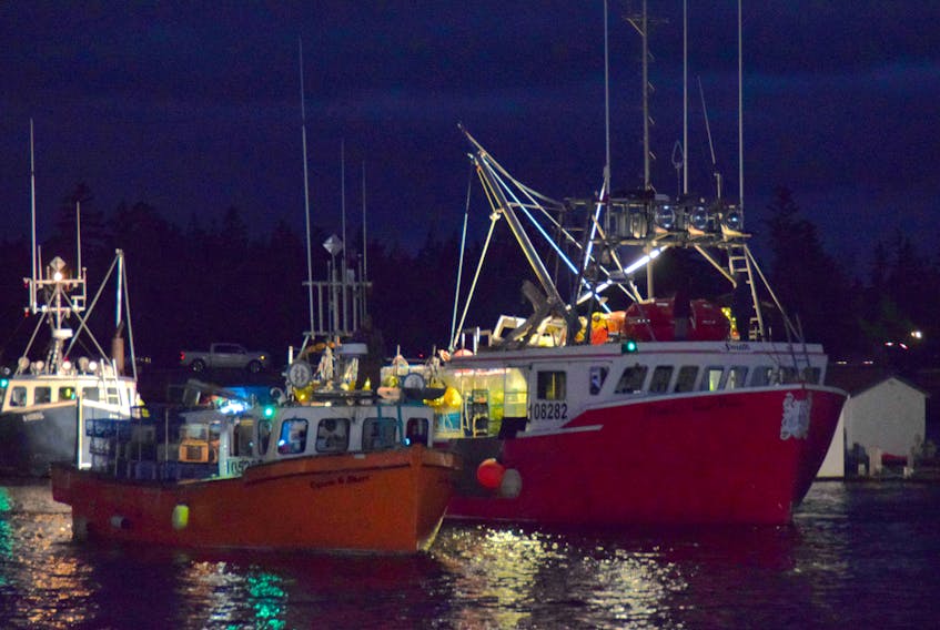 Fishing boats head to sea from the Port LaTour wharf in Shelburne County to start the lobster season in LFA 33 on Nov. 29. KATHY JOHNSON
