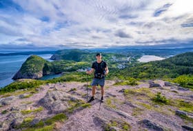 Jonathan Maillet stands on top of Sugarloaf Head overlooking Quidi Vidi Village in St. John’s, N.L. The Sydney man crossed the 336-kilometre East Coast Trail in Newfoundland in less than a week as part of a grant from the Night of Adventure speaker. The feat was documented by the Whycocomagh-based social-media influencer team Daveyandsky. Contributed