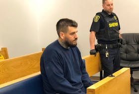 Matthew Jeremy Fowler, 31, was escorted into provincial court in St. John’s by sheriffs Wednesday, Oct. 19, for his bail hearing, which has been postponed for a week at his lawyer’s request. - Tara Bradbury