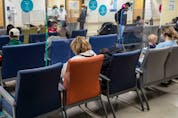 Parents with their children in the Montreal Children’s Hospital emergency waiting room in late October. “Because we didn’t see these viruses in the last few years, we’re seeing them all come together,” says one Ottawa doctor.