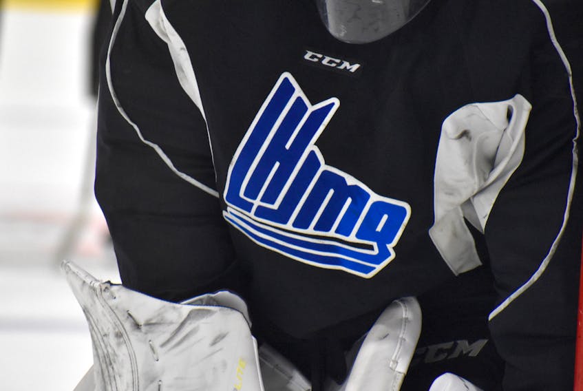 A goalie displays the QMJHL logo during a practice.
