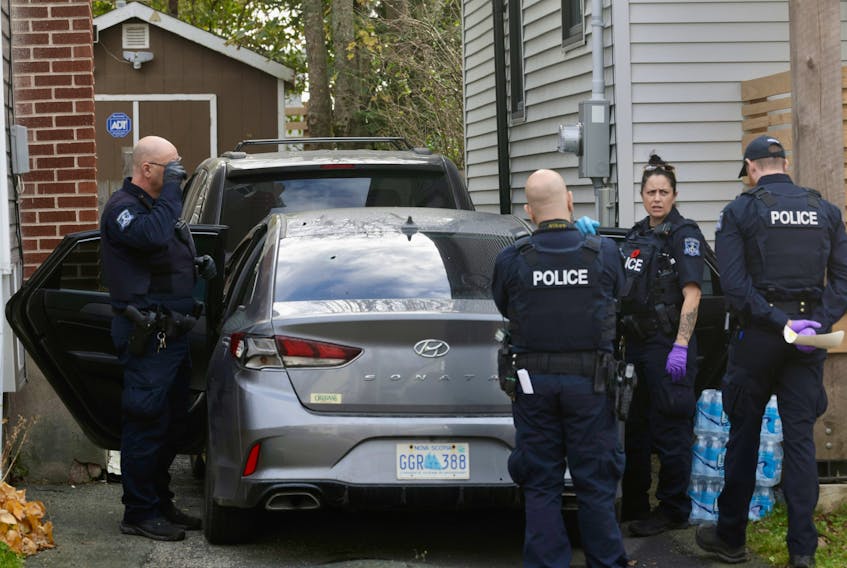 The Halifax Regional Police forensic unit investigates after a shooting early Monday morning at 11 Brookside Avenue in Dartmouth.