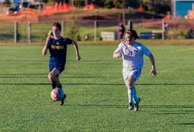 Holland Hurricanes left fullback Reid Peardon, 14, defends against a member of the Crandall Chargers during an Atlantic Collegiate Athletic Association (ACAA) men’s soccer game earlier this season. Holland College • Special to The Guardian