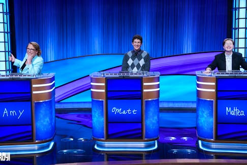 Jeopardy! champions Amy Schneider, Matt Amadio and Mattea Roach compete in an exhibition match as part of the quiz show's 2022 Tournament of Champions. The game aired Tuesday, Nov. 8. - Jeopardy! on Facebook
