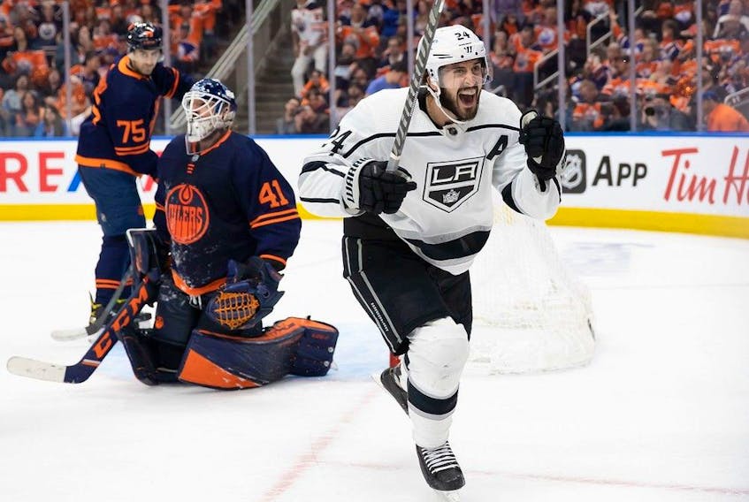 Los Angeles Kings' Phillip Danault (24) celebrates the game-winning-goal against goaltender Mike Smith of the Edmonton Oilers in Game One of the First Round of the 2022 Stanley Cup Playoffs at Rogers Place on May 2, 2022, in Edmonton. Danault, who played six seasons for the Canadiens, says he enjoyed his time in Montreal, but admitted he doesn't miss the media spotlight and seeing himself on a constant loop on TV after doing interviews.