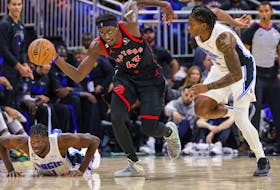 Raptors forward Pascal Siakam (43) brings the ball up court against Orlando Magic forward Admiral Schofield on Friday night. 

