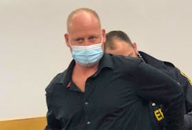 Sheriffs prepares to escort Jonathan Nash, 40, from a St. John's courtroom Dec. 9, 2022, after Provincial Court Judge James Walsh ordered him taken into custody upon convicting him of impaired driving causing the death of Kelly Winsor two years ago