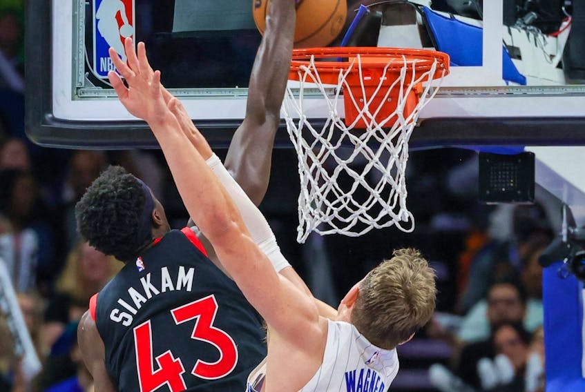 Toronto Raptors forward Pascal Siakam (43) dunks the ball against Orlando Magic center Moritz Wagner (21) during the second half at Amway Center. 