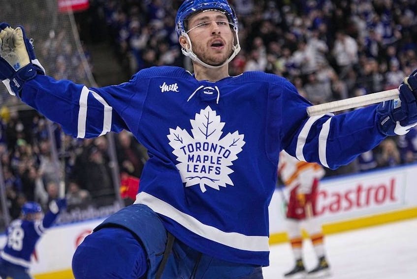 Toronto Maple Leafs forward Michael Bunting celebrates after scoring the game tying goal against Calgary Flames during the third period at Scotiabank Arena. 