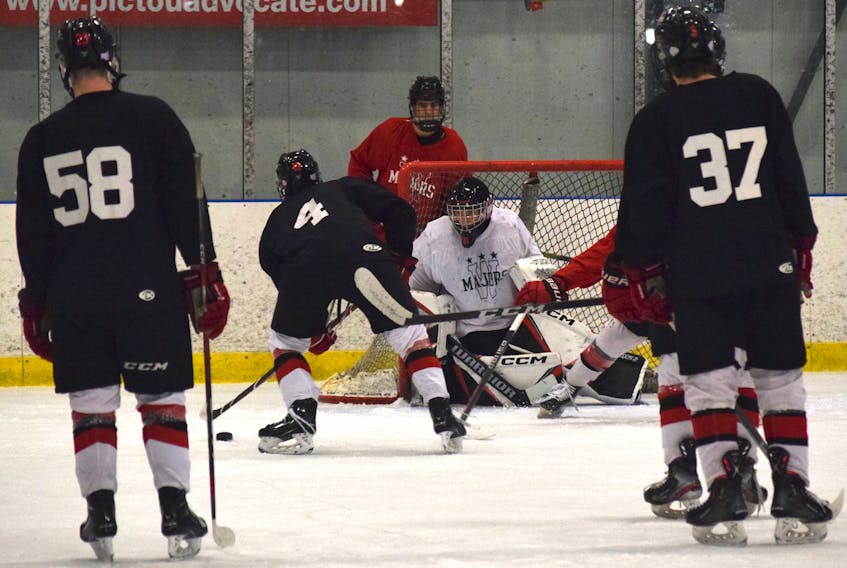 The Weeks U18 Majors have a one-point lead over Cole Harbour in the battle for first place in the Nova Scotia U18 Major Hockey League. - Ray Burns