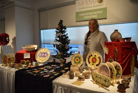Nancy Oakley was among 13 artists with their work on display when the Cape Breton Centre for Craft and Design hosted its first Mi’kmaq Christmas Craft Market on Thursday. The artists on display are working in contemporary and traditional Mi’kmaq craft. Beading, visual art, pottery, jewellery and other crafts were part of the market. Oakley has been a member of the centre for 22 years and specializes in stone-polished, smokey-fired pottery, utilizing many colours. She hopes Thursday’s market becomes the first of many hosted by the centre. Her creations can also be seen at Fortress Louisbourg, the Art Gallery of Nova Scotia and many other spots. GREG MCNEIL/CAPE BRETON POST