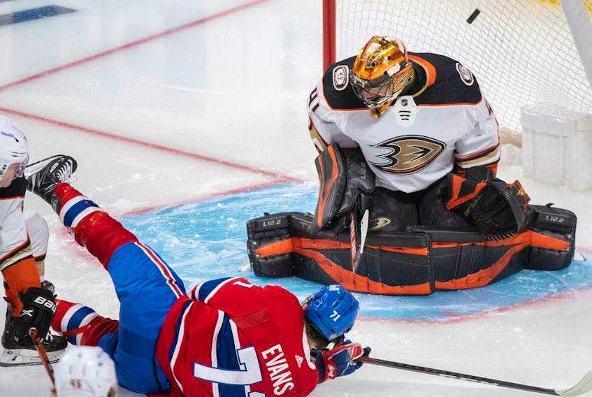 Montreal Canadiens' Jake Evans (71) scores against Anaheim Ducks goaltender Anthony Stolarz during second period NHL hockey action in Montreal, Jan. 27, 2022.