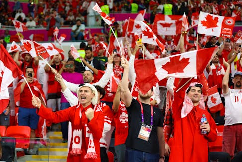 Canadian fans cheer during the FIFA World Cup opening match against Belgium at Ahmad Bin Ali Stadium in Al Rayyan, Qatar. 
